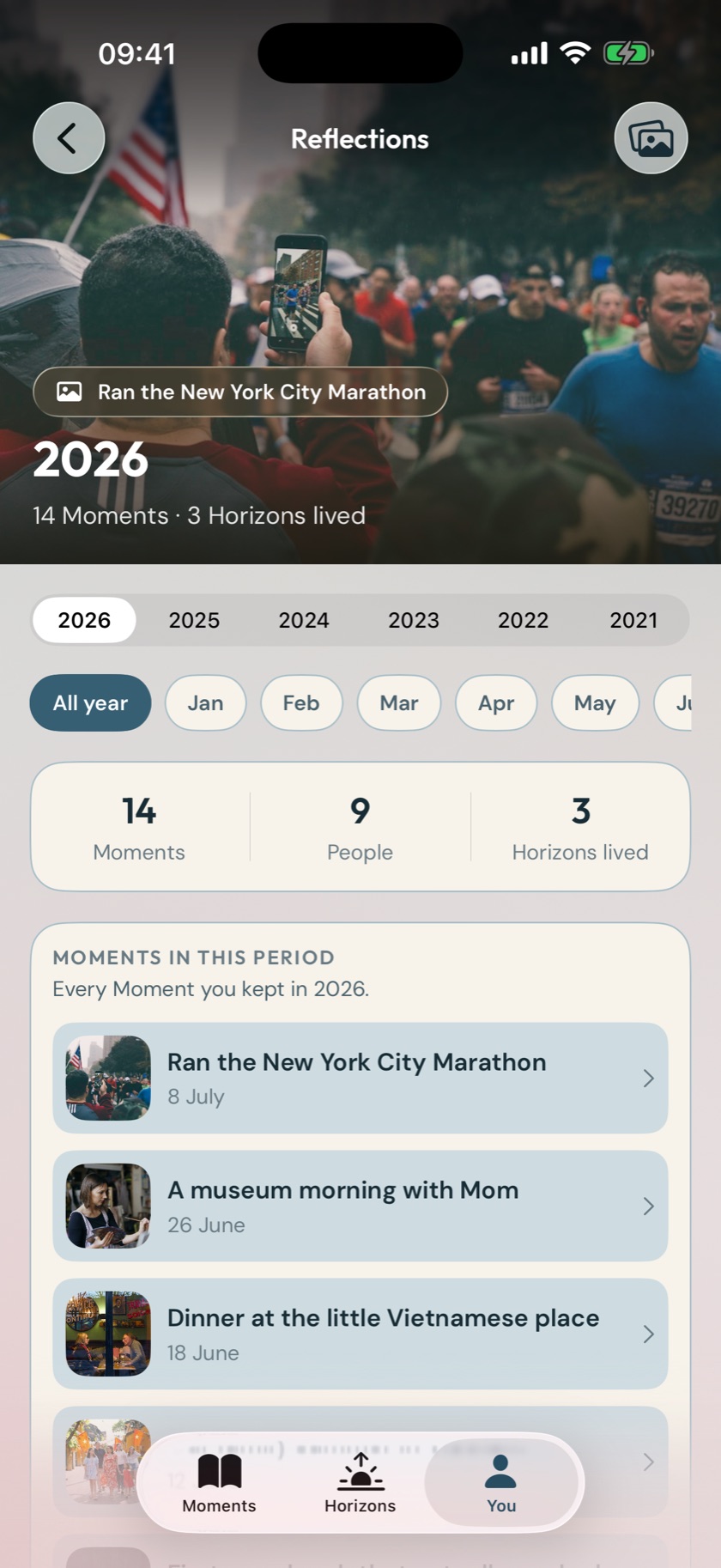 A Reflection in Once & Someday on iOS 26 with month and year choices, counts, and Moments from the selected period